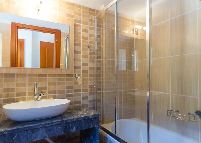 アパートホテル Ntinas Filoxenia & 4*